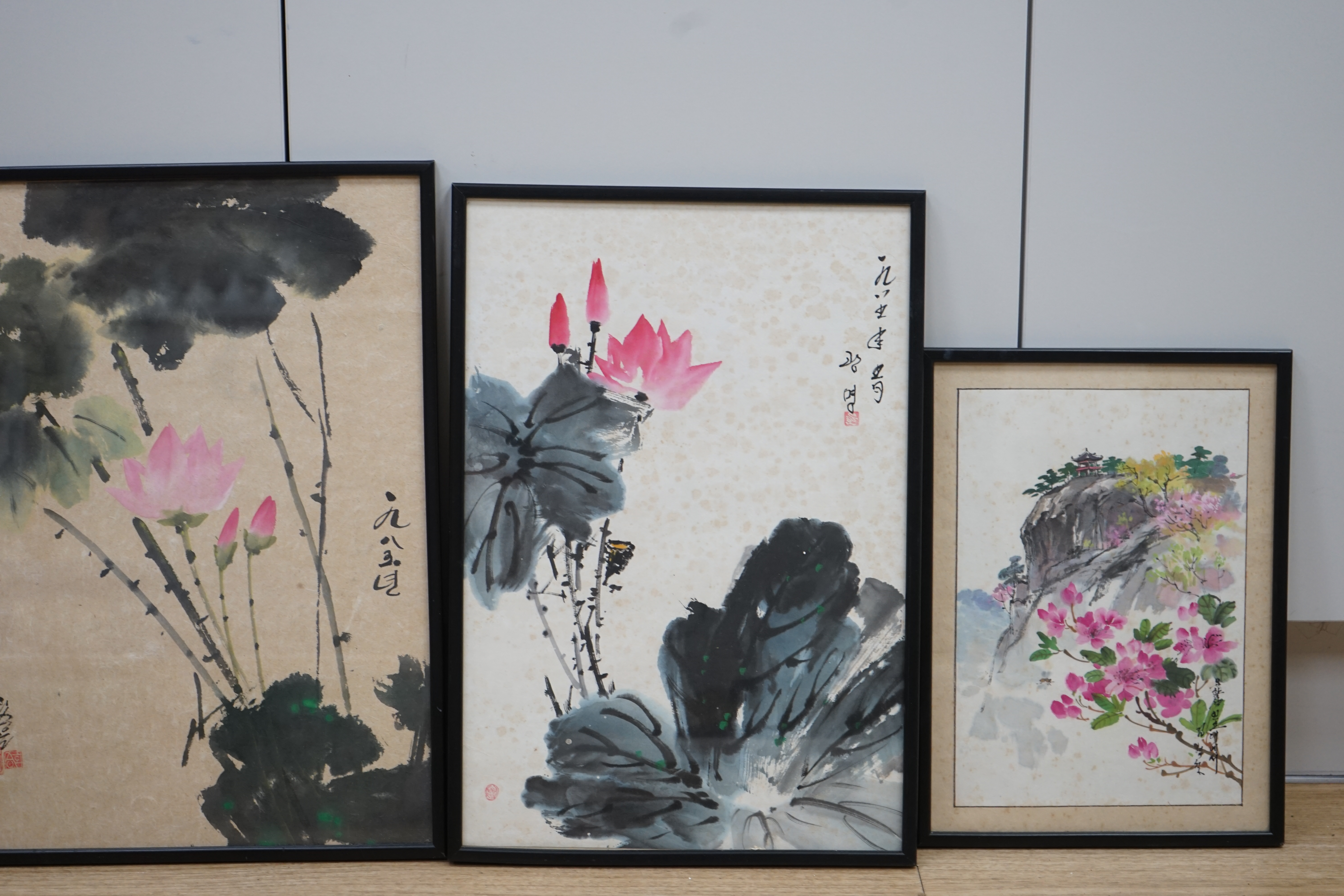 20th century Chinese School, four pictures, Flowers and landscape with pagoda, largest 44 x 29cm. Condition - poor, discolouration and foxing throughout